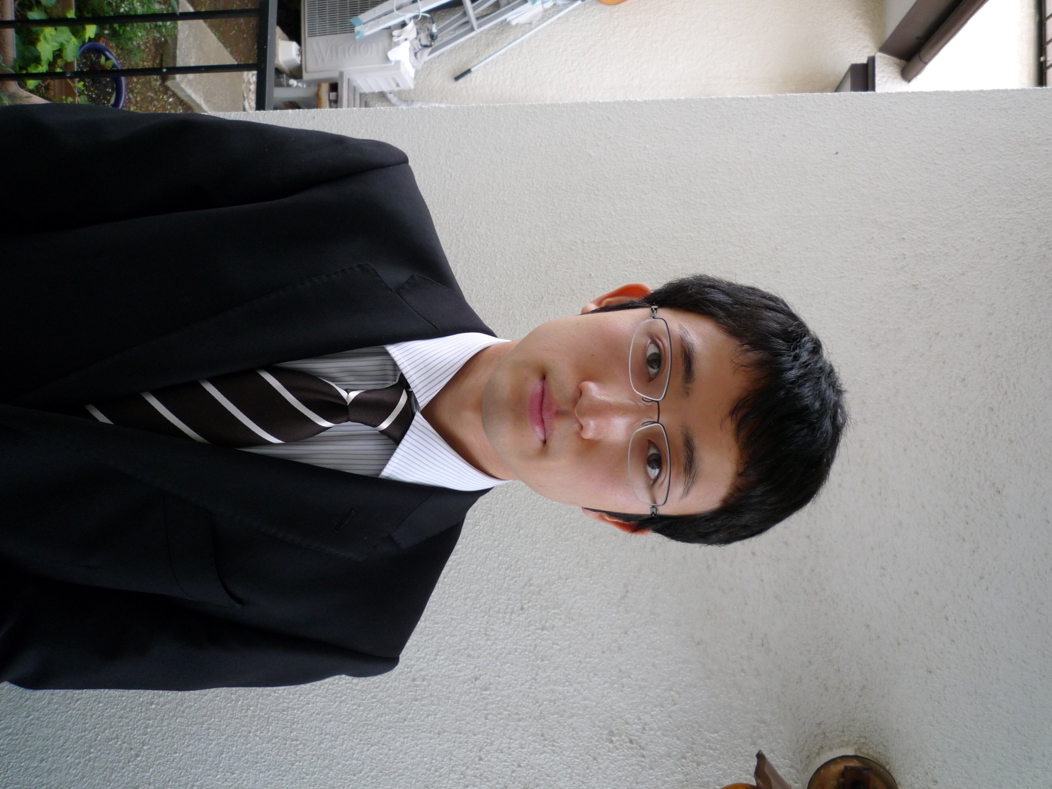 飛田 憲人